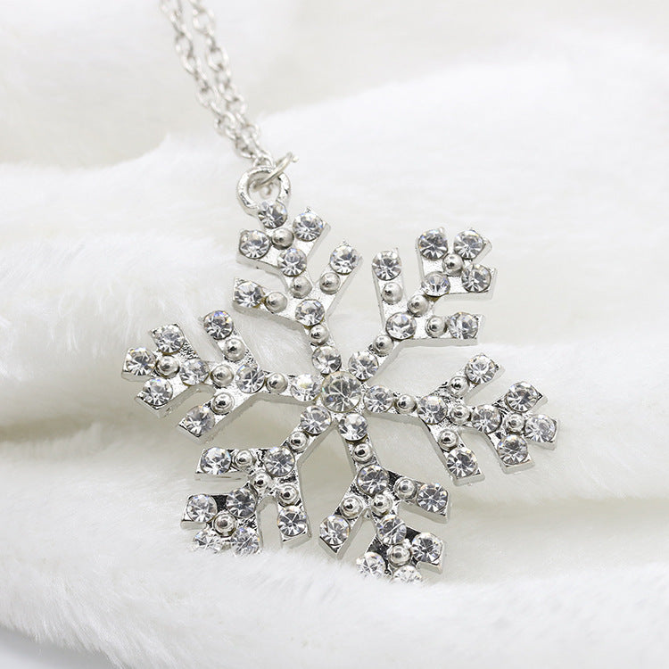 https://www.elegantliving.org.uk/products/fashion-diamond-crystal-snowflake-pendant-necklace?_pos=1&_sid=497139fef&_ss=r
