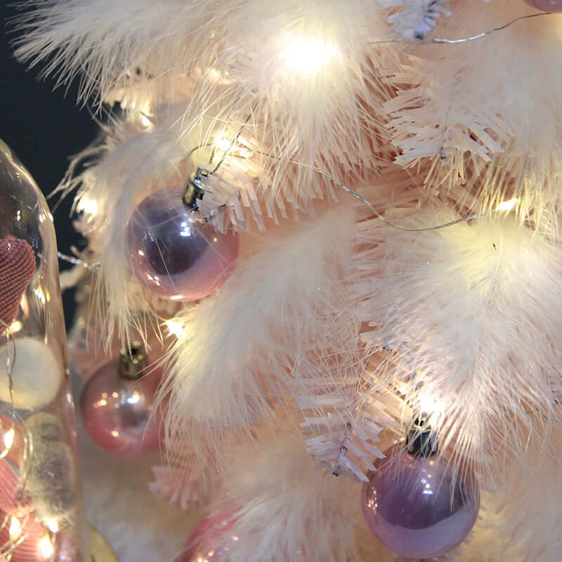 https://www.elegantliving.org.uk/products/christmas-ornament-desktop-small-tree-christmas-tree-pink-feather-decoration-tree?_pos=1&_sid=d4473803c&_ss=r